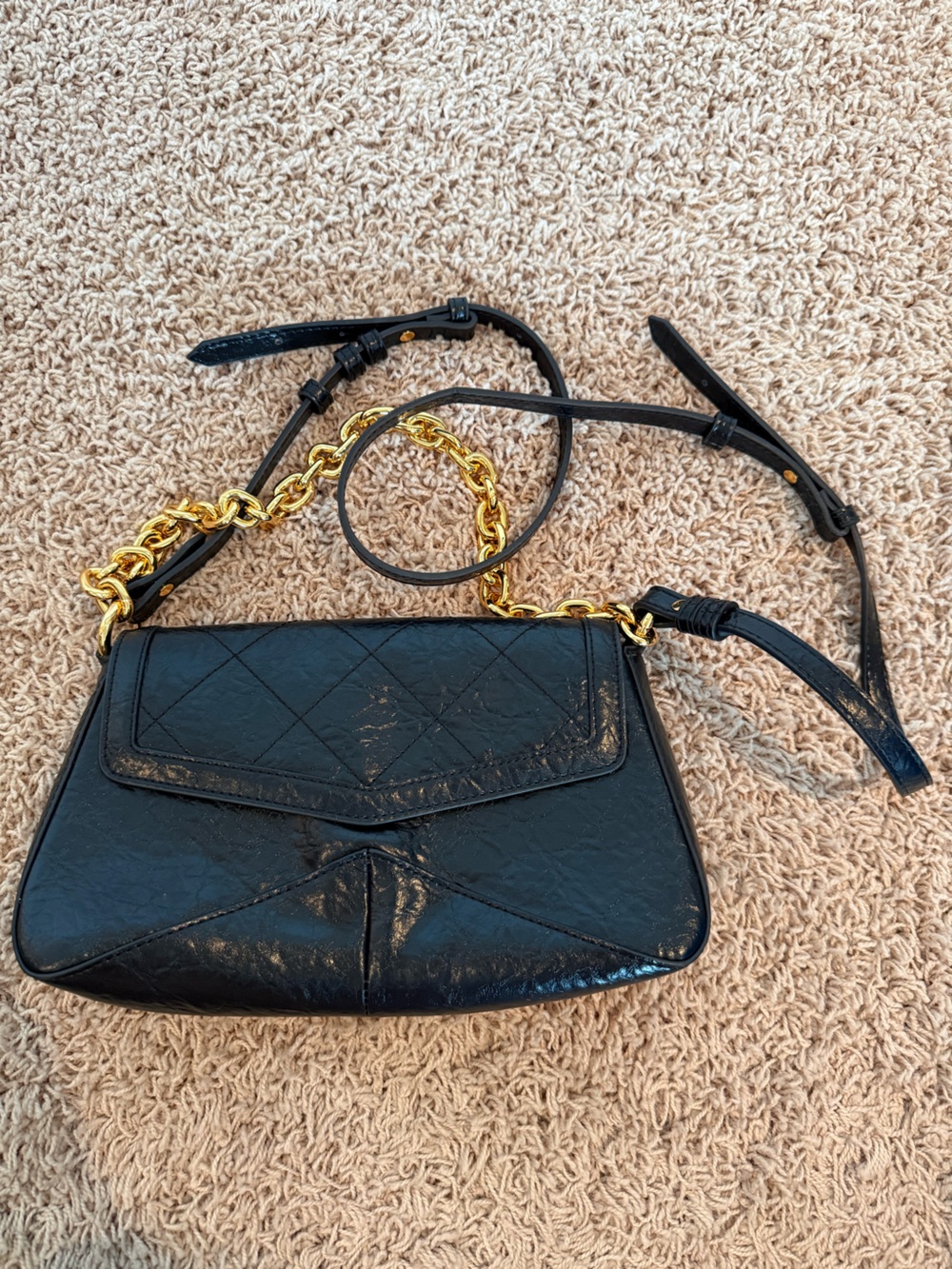 Charles & Keith Black Quilted Crossbody Bag with Gold Chain Strap